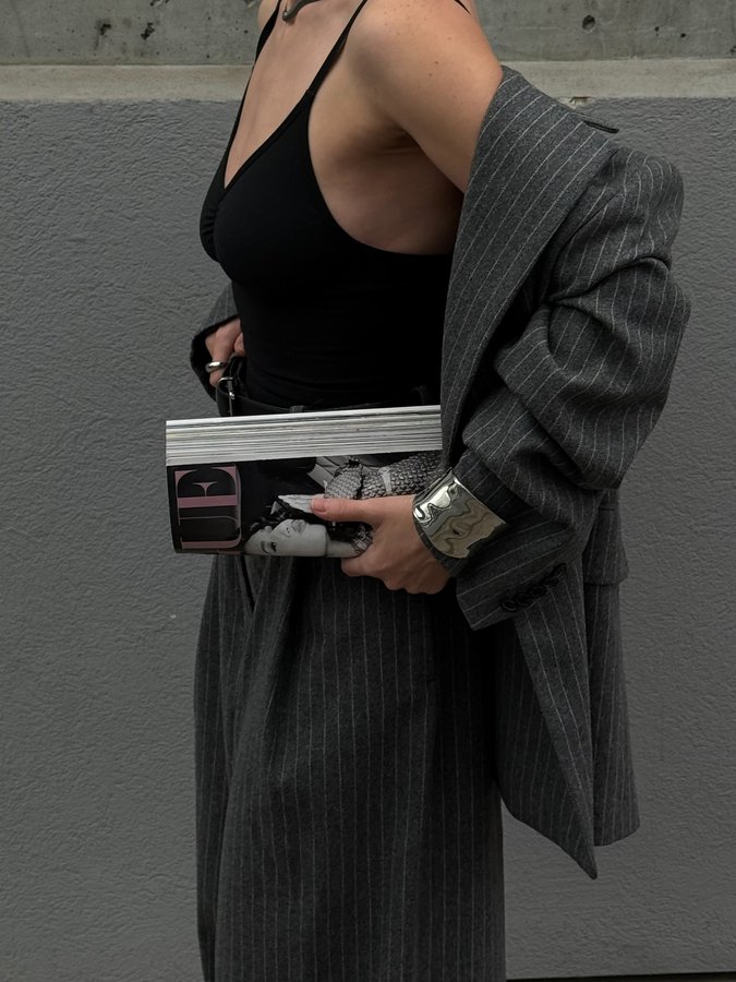 Instagram post by @eglepetraskaite for BUTTONSCARVES. Caption reads: Grey on grey addiction ☁️

Handbag @buttonscarves....