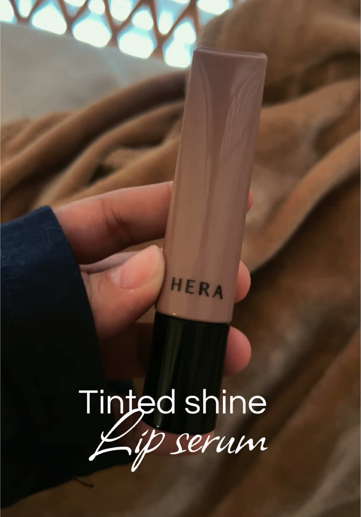 TikTok post by @nikkirivass for HERA KR. Caption reads: Using shade Brown sugar 🤎🫦 @HERA KR....