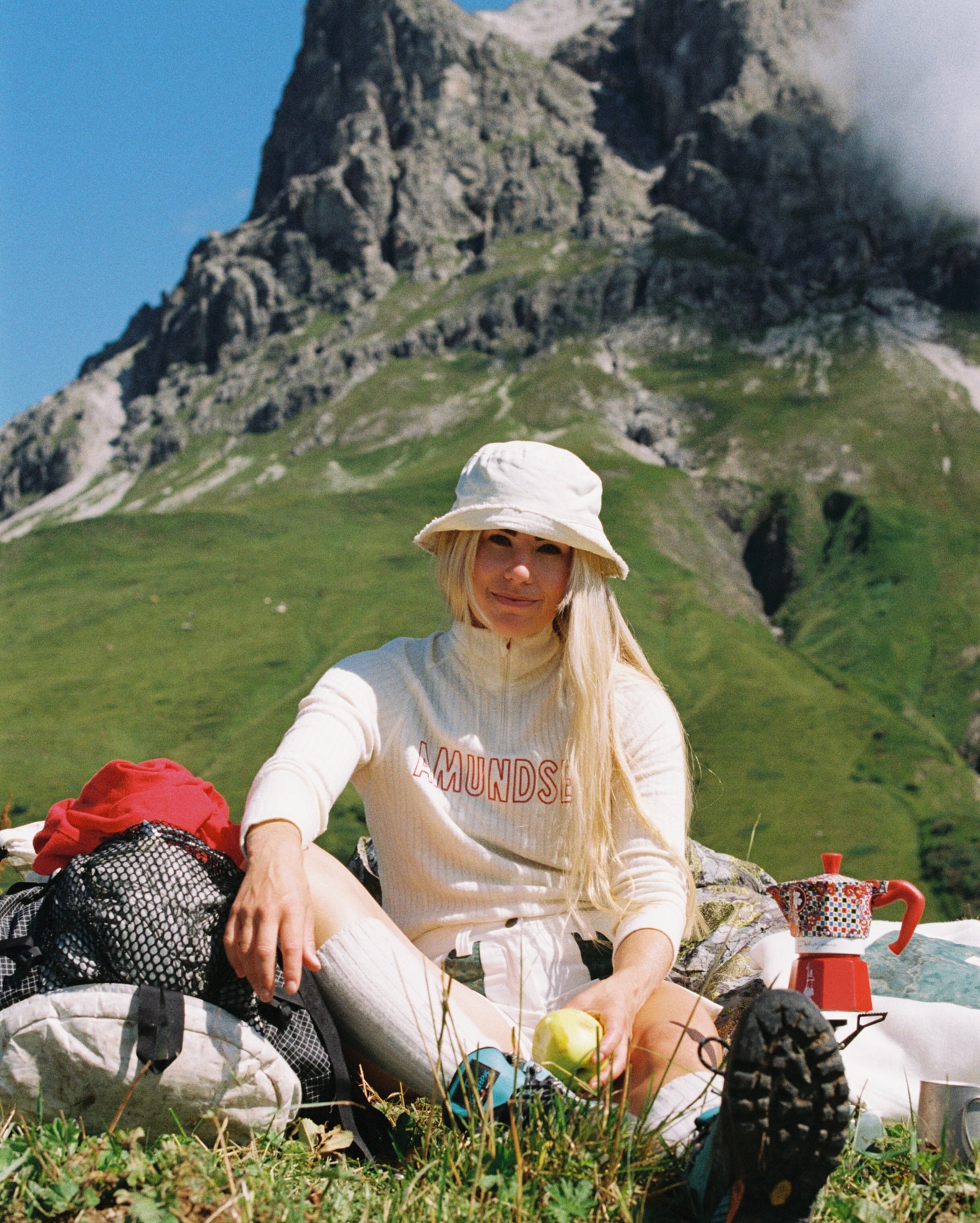 Instagram post by @strolzangela for Snow Peak. Caption reads: [Ambassador of the Alpine Summer • @strolzangela ]....