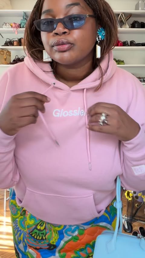 Instagram post by @gabriellak_j for Glossier. Caption reads: [...] hoodies are eternal. And @glossier is....