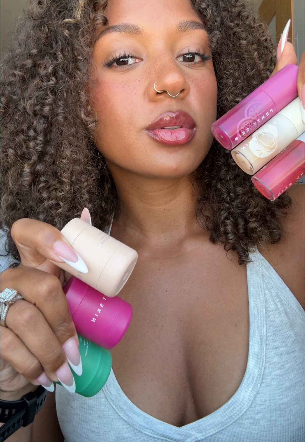 TikTok post by @leigha_chrstine for Fenty Beauty. Caption reads: [...] most hydrating lip duo 🫦 @Fenty Beauty....