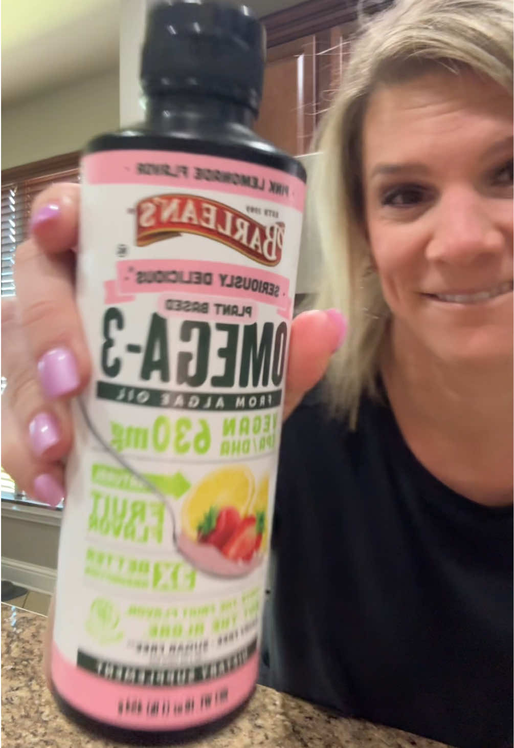 TikTok post by @thamillsfam for Barlean's. Caption reads: Oh so Yummy! @Barlean's  Pink Lemonade Swirl 1....