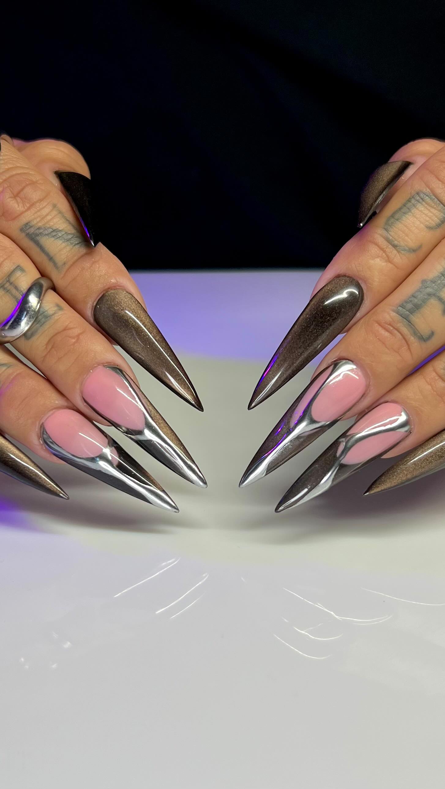 Instagram post by @courtneycantwell_nails for VBeautyPure. Caption reads: 🤎⛓️‍💥Gels 048, 176,  Chrome - Steel , black gel....