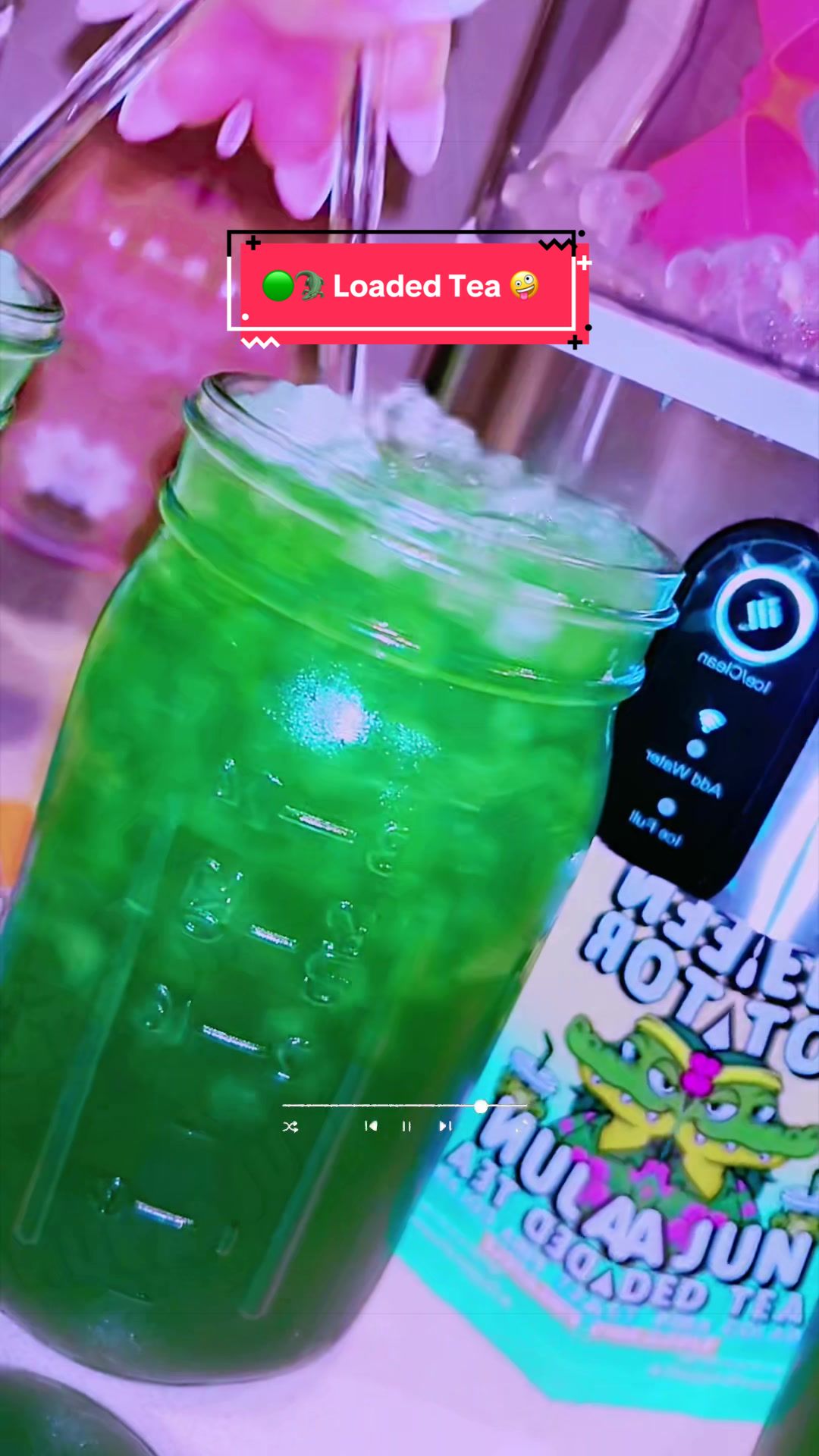 TikTok post by @graciela.ndrea for Kajun Loaded Tea. Caption reads: @KaJun Loaded Tea green gator 🐊 #loadedteasathome....