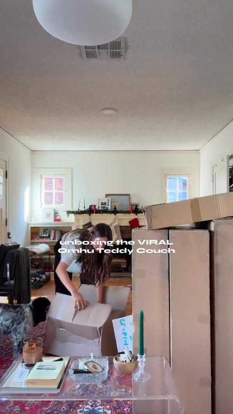 Instagram post by @sophmosca for OMHU. Caption reads: my dream couch in my dream house☁️🏡 @omhu_cph #ad.