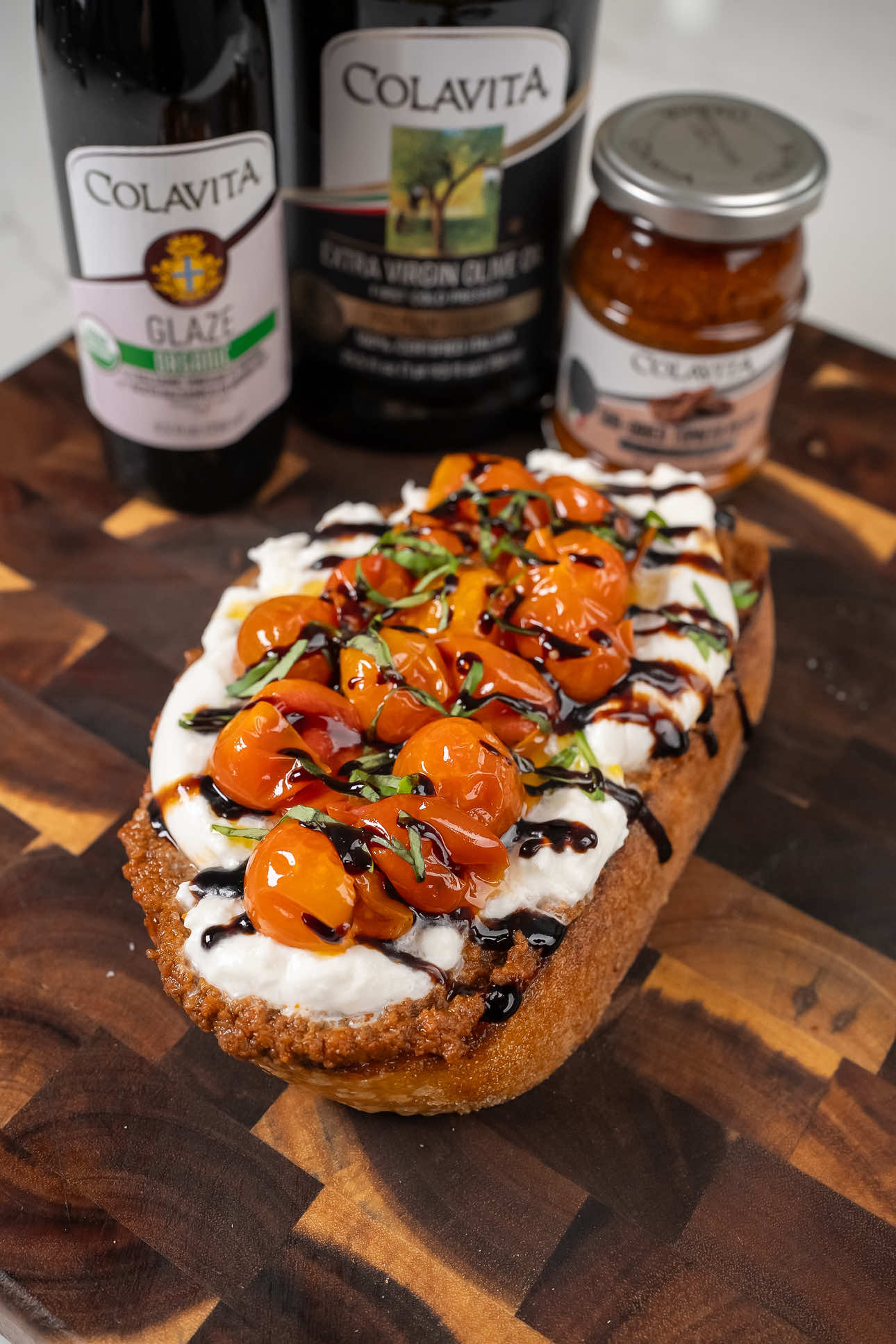 TikTok post by @breadbakebeyond for Colavita. Caption reads: Been making this toast a lot lately. Crispy....