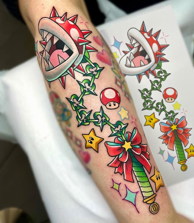 Instagram post by @deadpan_anne_tattoo for Barber DTS Tattoo Supplies. Caption reads: 💖Nintendo Flails💖 I’d loooooooooove to do more....