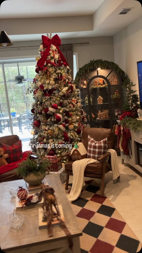 Instagram post by @athomewithflore for King of Christmas. Caption reads: This stunning 9 ft @kingofchristmas is ready for....