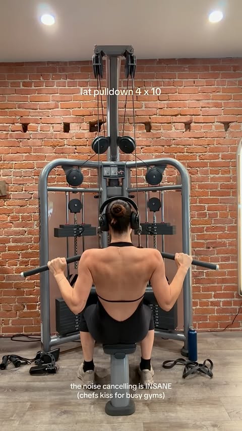 Instagram post by @aaliyahmendes for JLab. Caption reads: my upper body essentials @jlabaudio #ad ☁️☁️☁️....