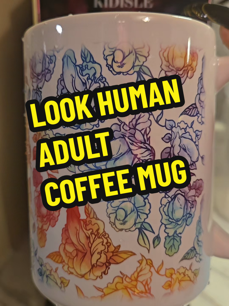 TikTok post by @damamasofrecovery for LookHUMAN. Caption reads: @LookHUMAN #adultcoffeemug #lookhuman [...].