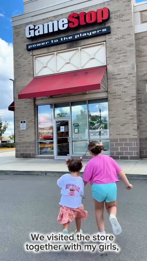 Instagram post by @qbrainusa for GameStop. Caption reads: Family day at GameStop! 🎮✨ We visited the store....