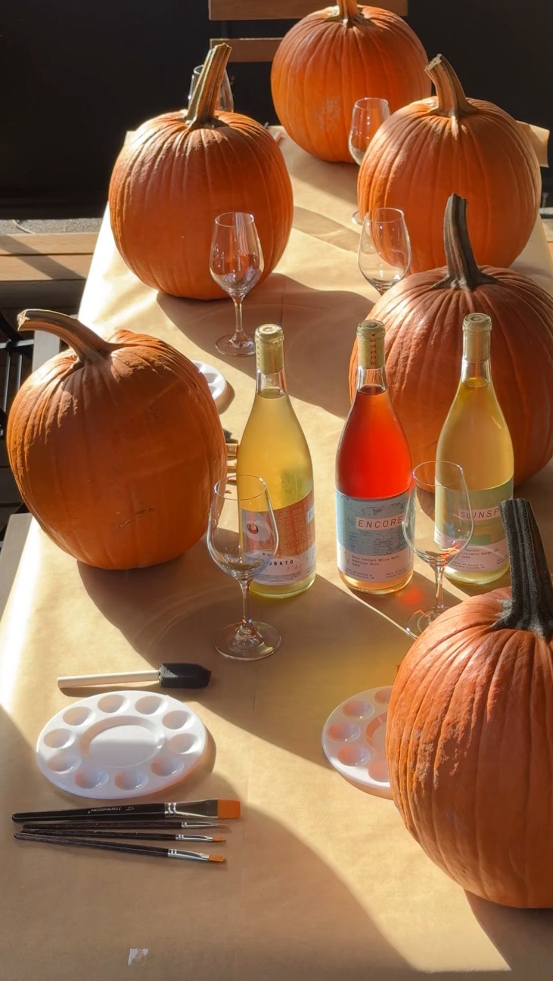 Instagram post by @foodiesnitch for Evite. Caption reads: Pumpkin paint ‘n sip party 🎃🍷🎨

Supplies....