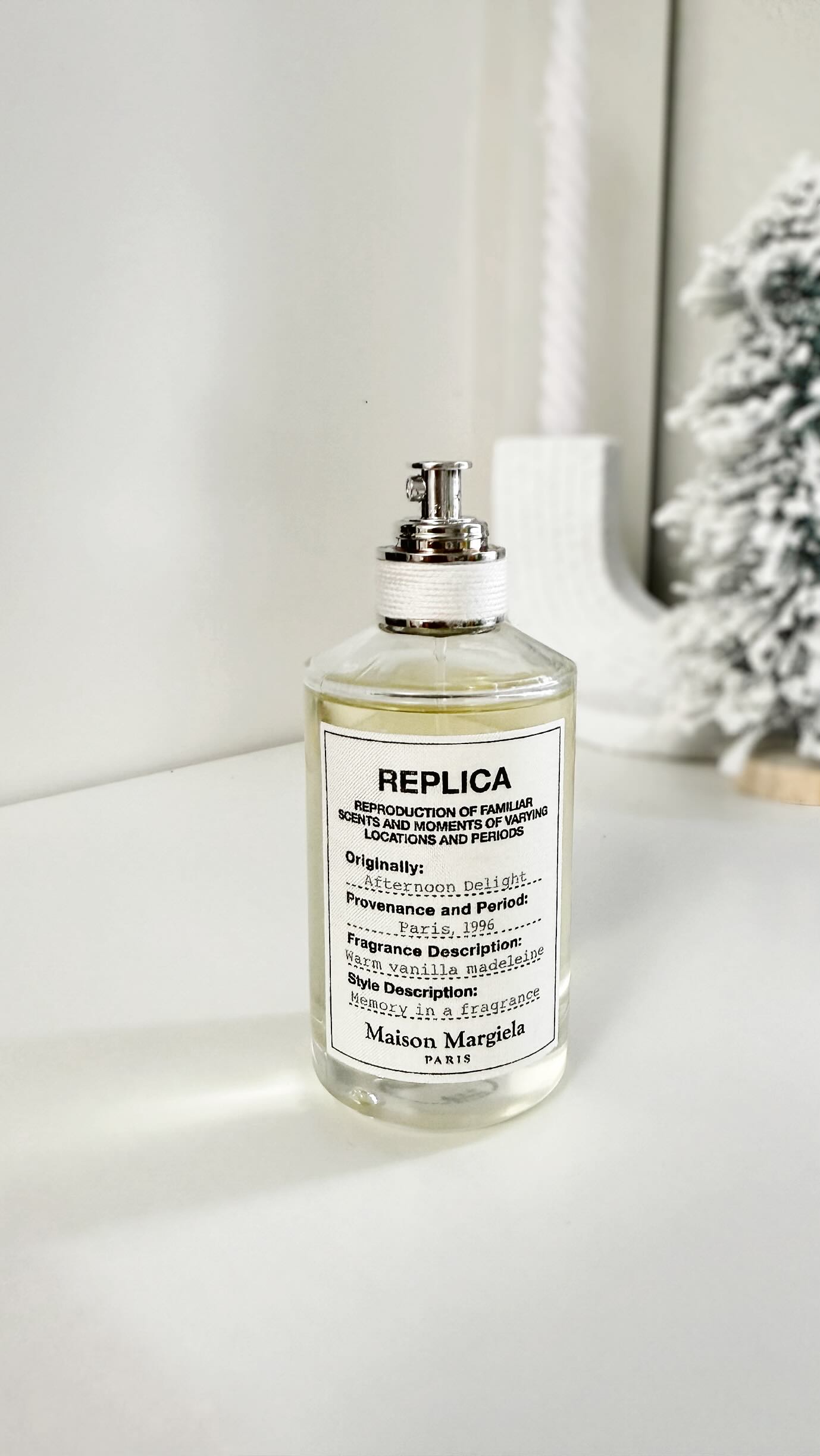 Instagram post by @karolsullivan for Maison Margiela Fragrances. Caption reads: Afternoon Delight by @maisonmargielafragrances....