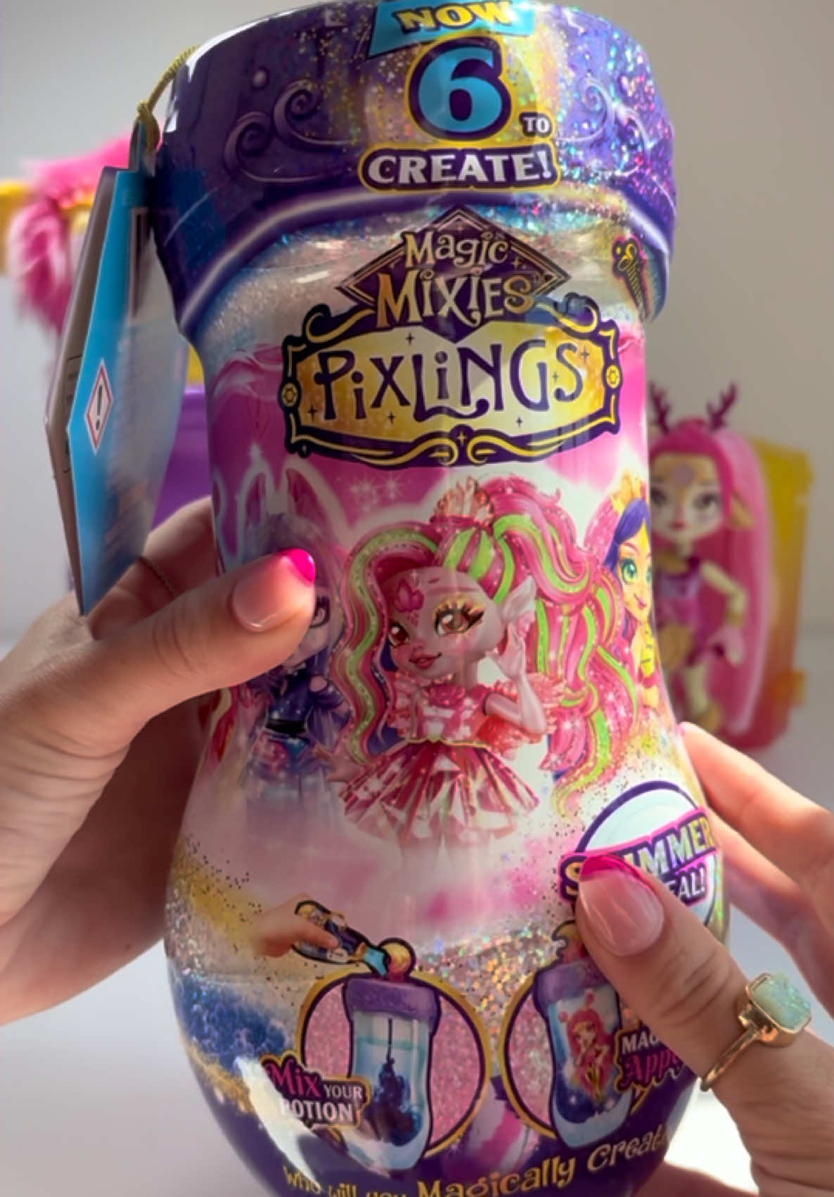 TikTok post by @.xoxo.toys for MooseToys. Caption reads: Opening the Magic Mixies Pixlings Shimmer Reveal!....