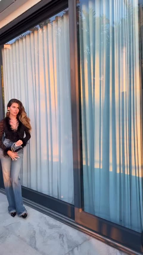 Instagram post by @constanzeaurelia for Outcast Clothing. Caption reads: ootd by - jeans: @ysl blouse: @outcastclothing 🖤....