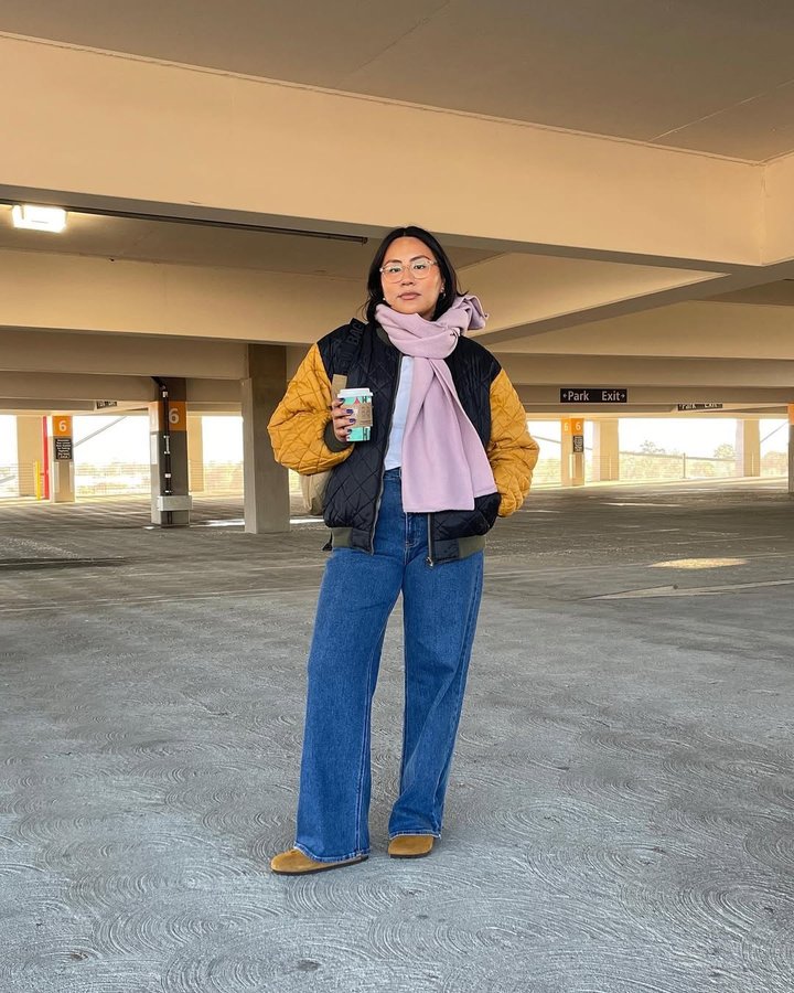 Instagram post by @vallerinagirl for Just Black Denim. Caption reads: just me, my holiday drink, and @justblackdenim....