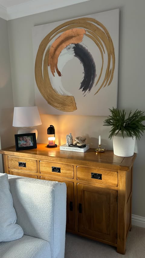 Instagram post by @thedownhomeliving for SwitchBot. Caption reads: Let the world 🌍 wait — it’s candle season comfort....