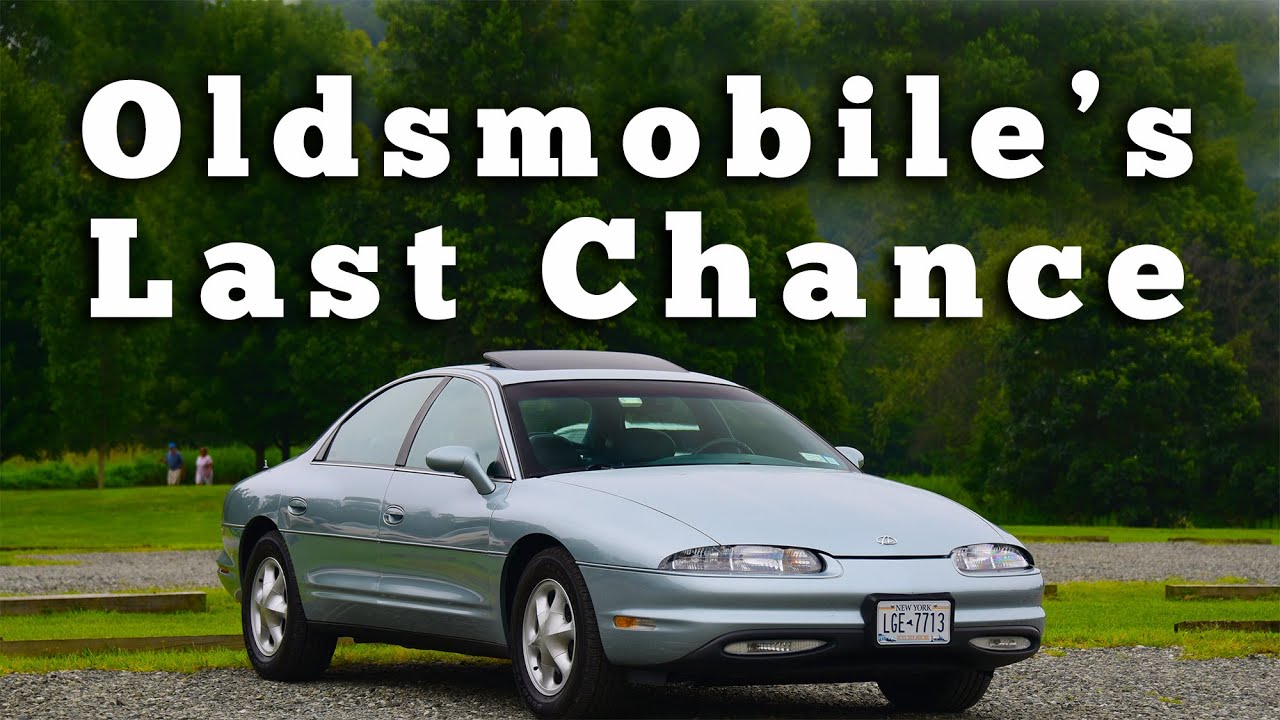 YouTube post by @RegularCars for Zazzle. Caption reads: 1997 Oldsmobile Aurora: Regular Car Reviews .