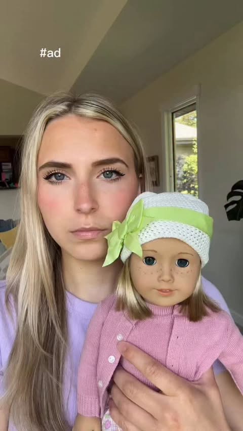 Instagram post by @emilyzugay for American Girl. Caption reads: [...] at my face for the next 40 years....