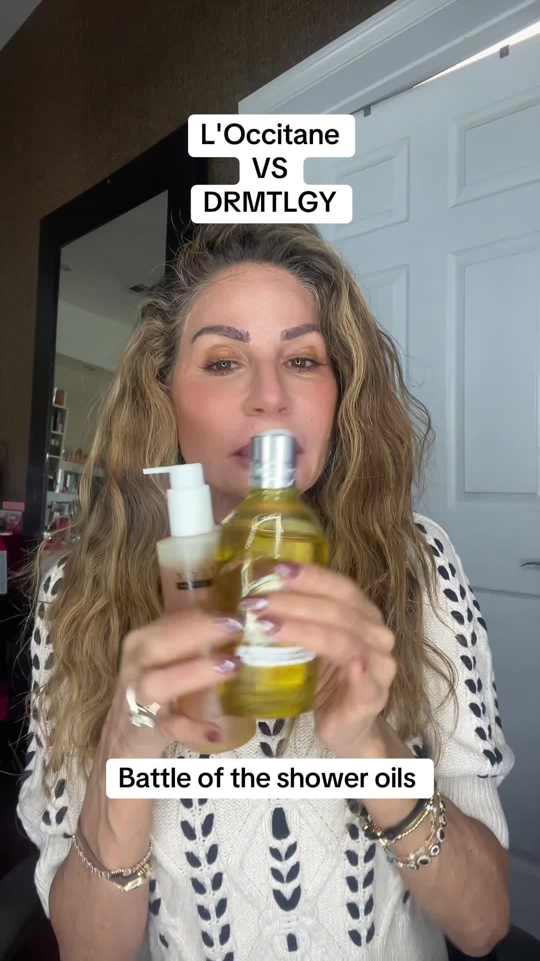TikTok post by @arianemann for DRMTLGY. Caption reads: Two shower oils that feel the same… but one has a....