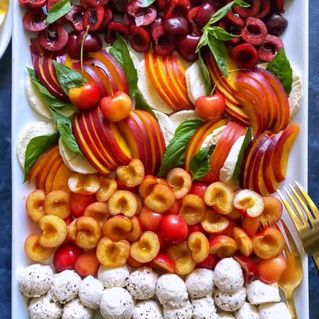 Instagram post by @thedelicious for Real California Milk. Caption reads: Sweet juicy cherries and sun-ripened nectarines....