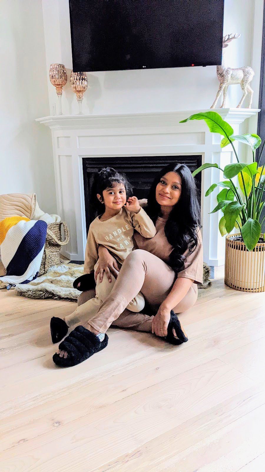 Instagram post by @amplifiedsoul for The Bay. Caption reads: I am obsessed with our matching Mommy & Me outfits....
