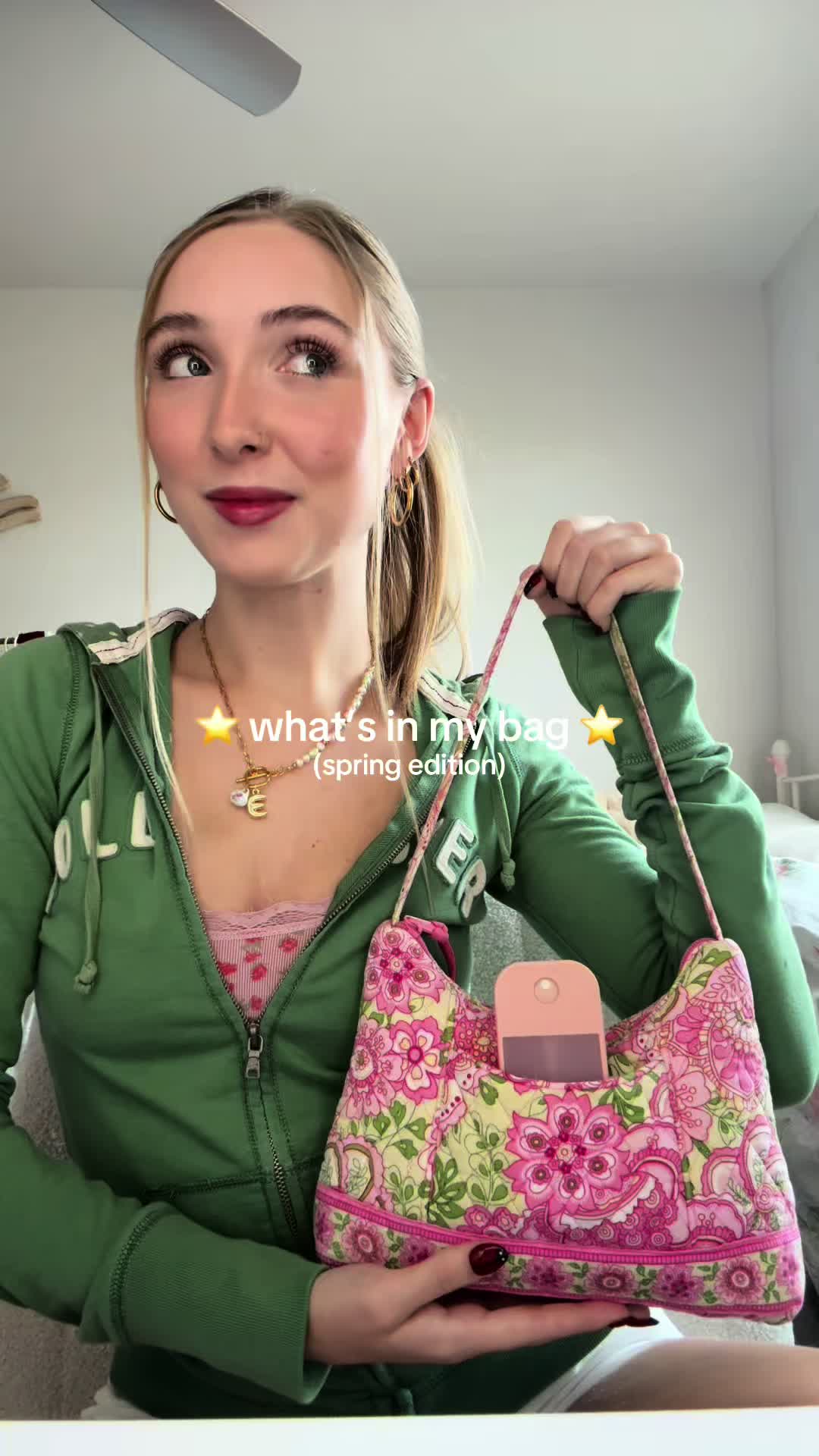 TikTok post by @emmalizzz for Touchland. Caption reads: what’s in my bag? @touchland glow essence blush....
