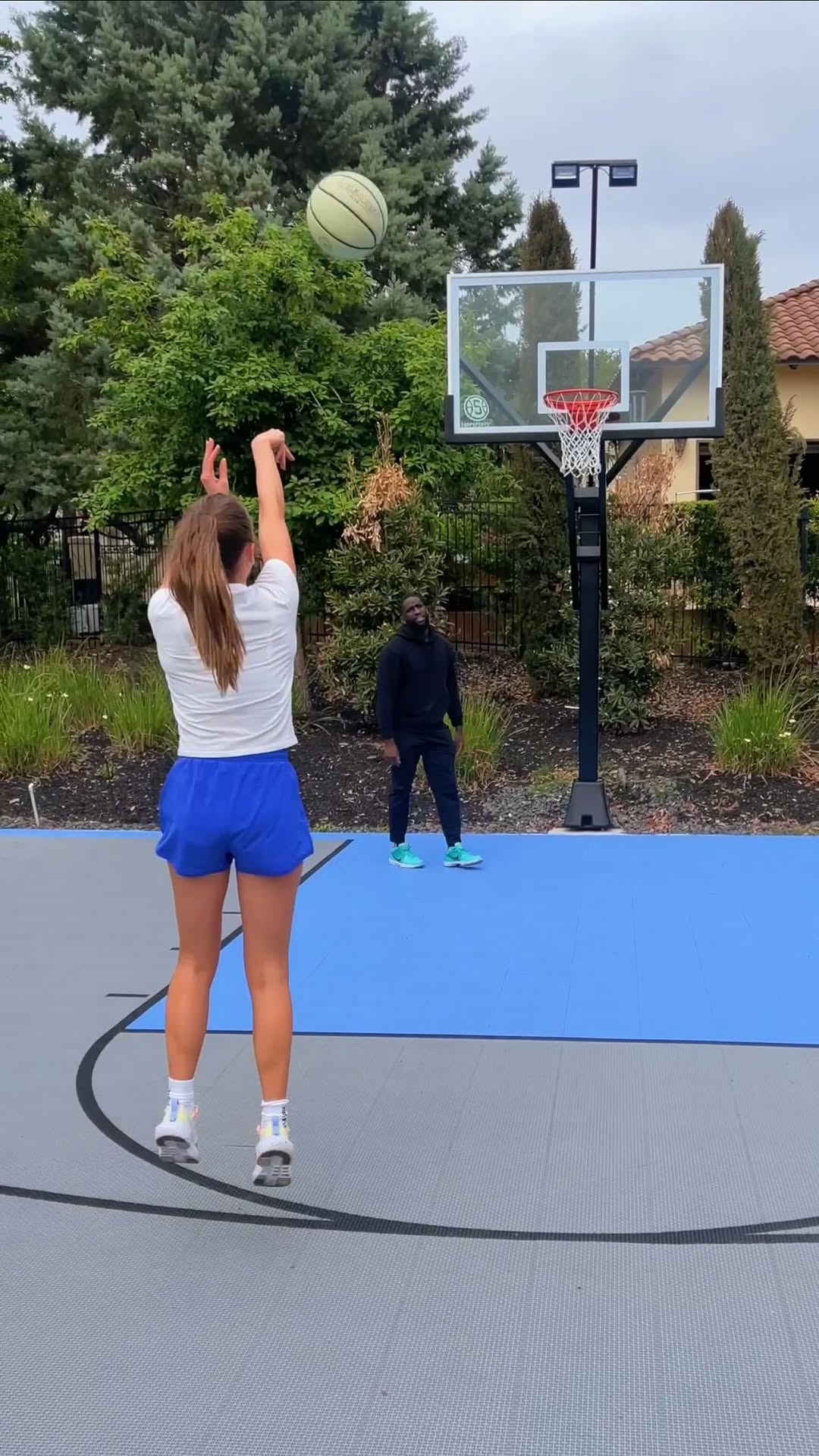 Instagram post by @rademita for Fitbit. Caption reads: and you guys didn’t think I could dunk 🤪! s/o to....