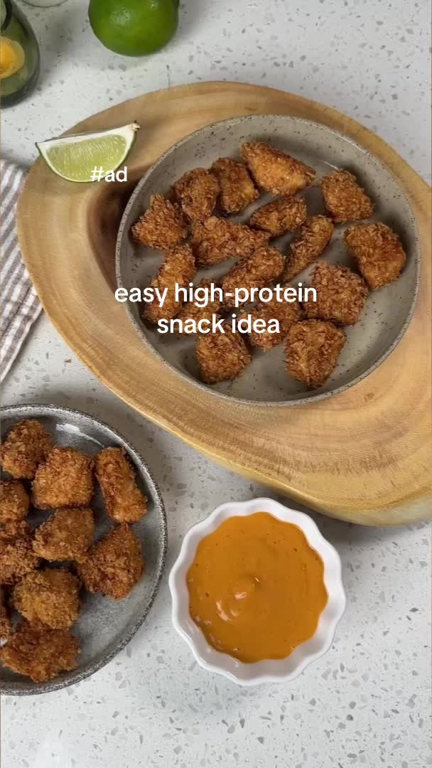 TikTok post by @kimthefoodie for SimplyProtein. Caption reads: #ad Juicy air fryer chicken bites with chipotle....