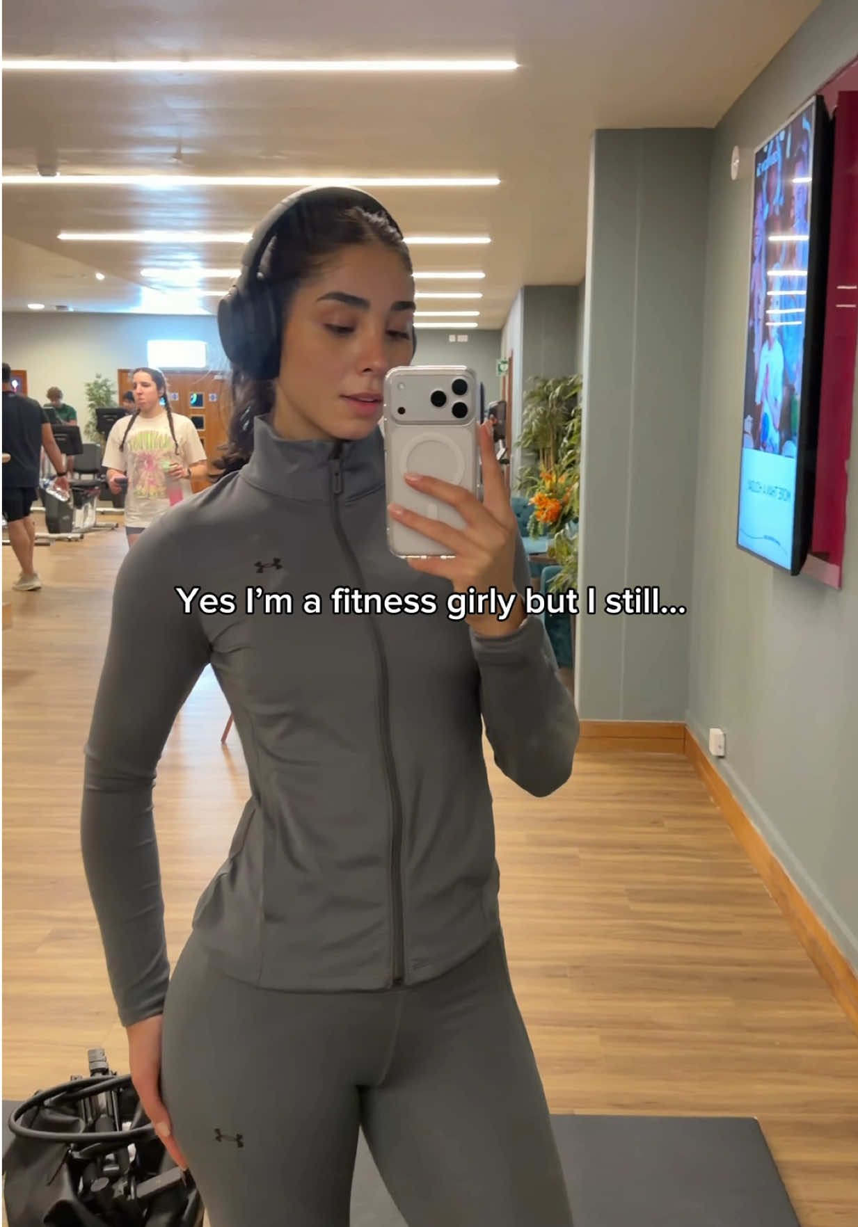 TikTok post by @kimgfit for Under Armour. Caption reads: [...] set. Lately i’ve been living in the Under....