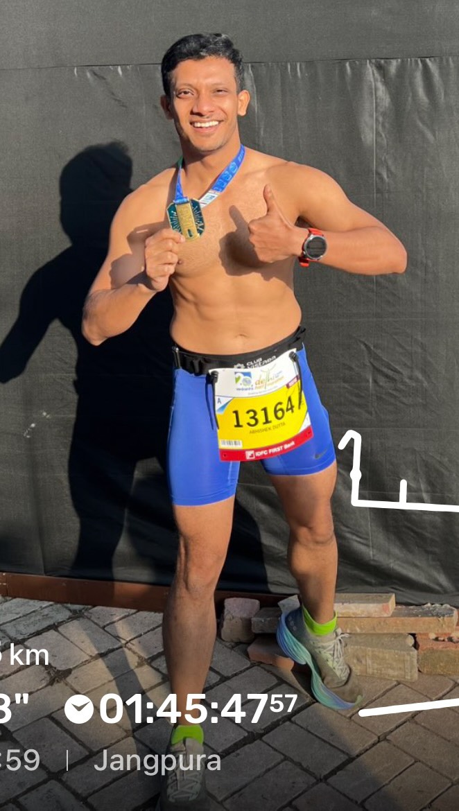 Instagram post by @abkdutta for Amazfit. Caption reads: Done n dusted @delhihalfmarathon in 1:44:44 hrs…....