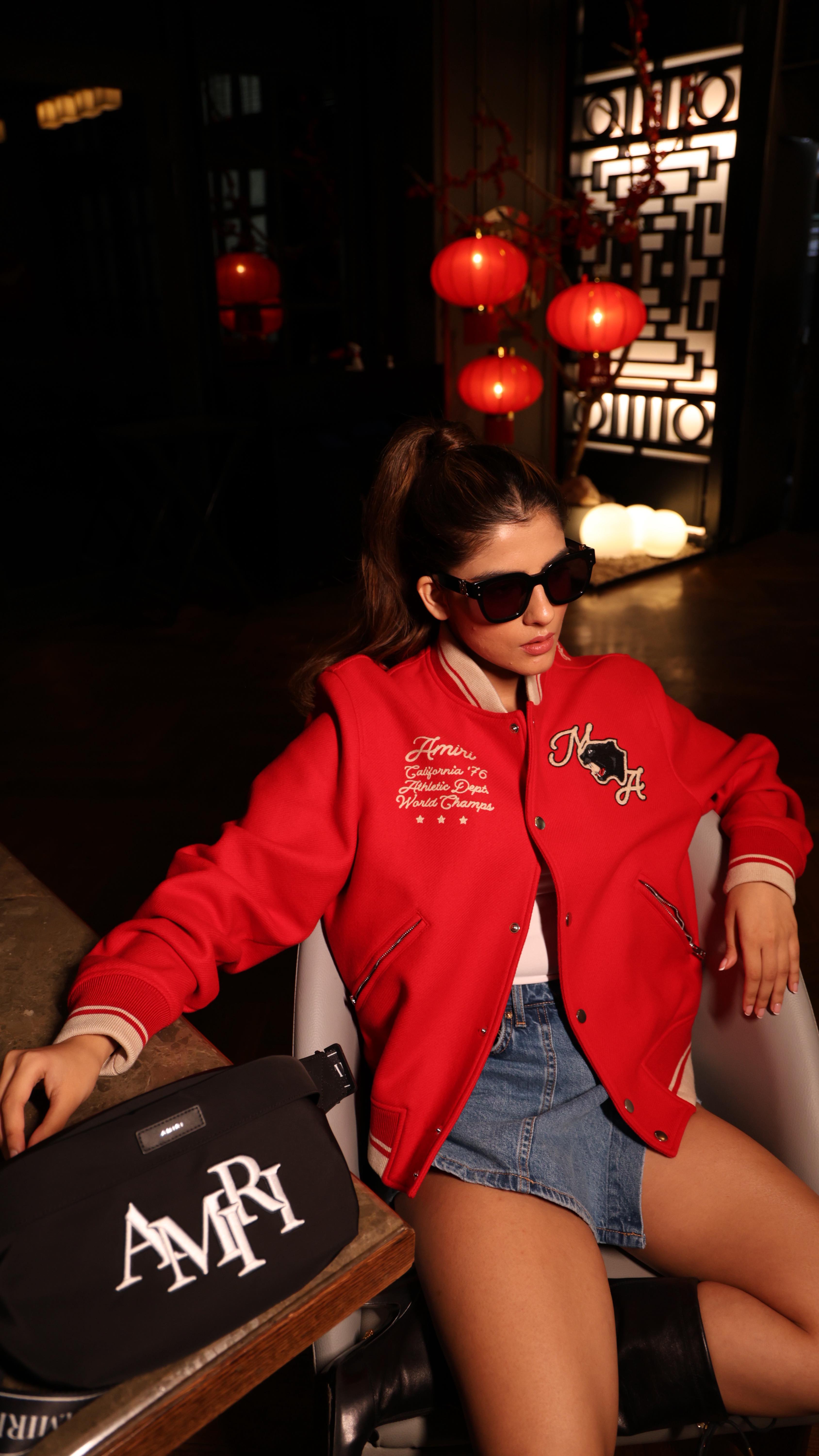 Instagram post by @ishita_chopraa for AMIRI. Caption reads: [...] days when edge feels like elegance 🖤 @amiri....