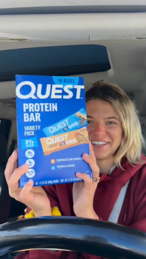 Instagram post by @clairekgroves for Quest Nutrition. Caption reads: RUN to Costco 🏃‍♀️ @questnutrition Chocolate Chip....