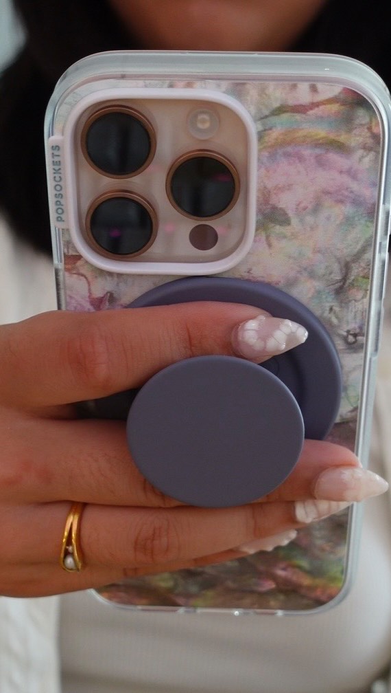 Instagram post by @cozycornerkai for PopSockets. Caption reads: I’ve been a PopSockets girly for ages, truly.....