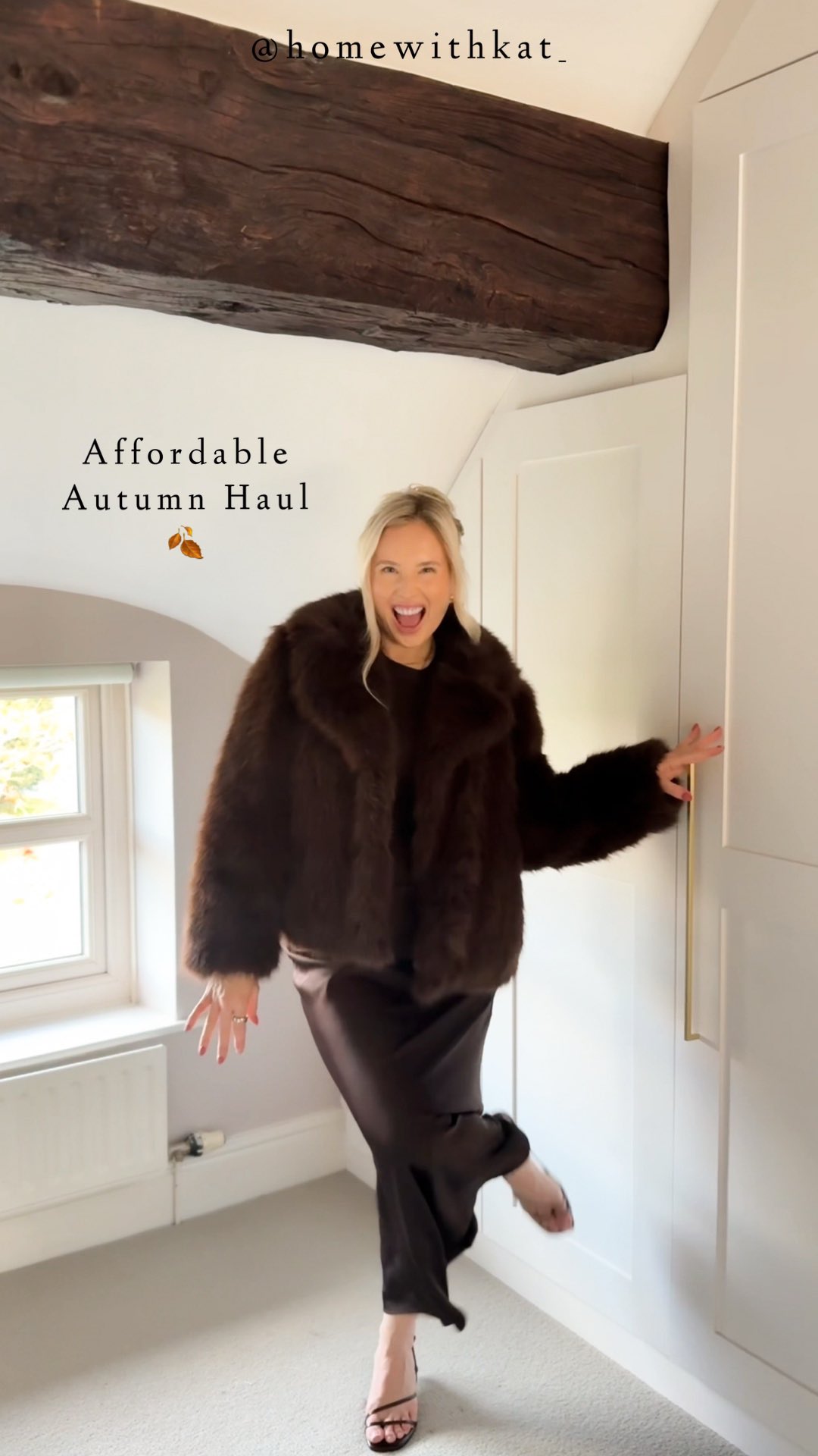 Instagram post by @homewithkat_ for Peacocks. Caption reads: CAN WE TAKE A SECOND FOR THE COAT 🙊🍂 omgggg!....