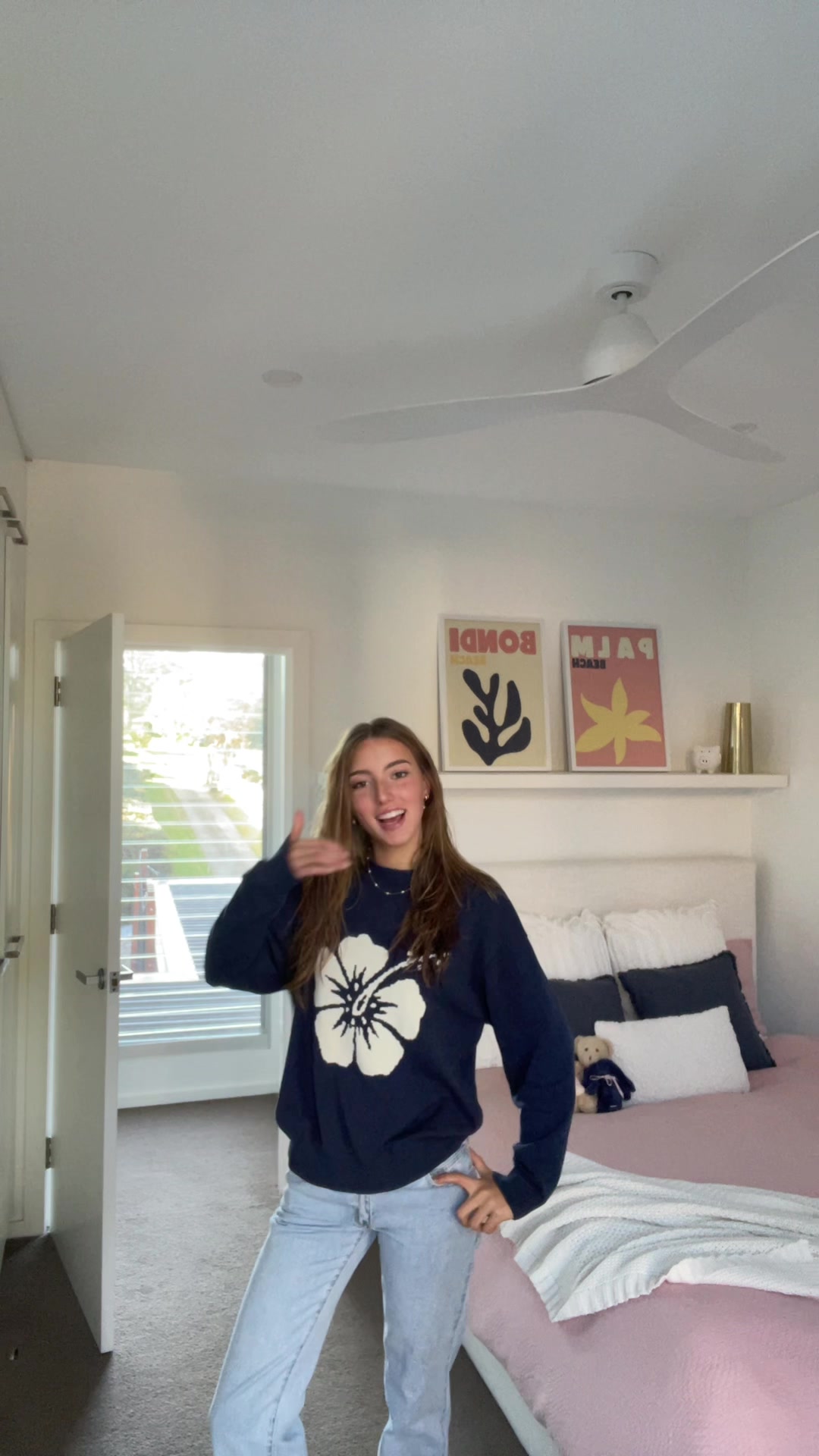 TikTok post by @itsalicia_07 for Okanui. Caption reads: Another one for the cutest sweater ever @Okanui 🌺....