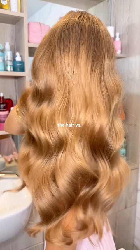Instagram post by @byemmaleah for OUAI. Caption reads: [...] for the glossiest hair!! products @theouai....