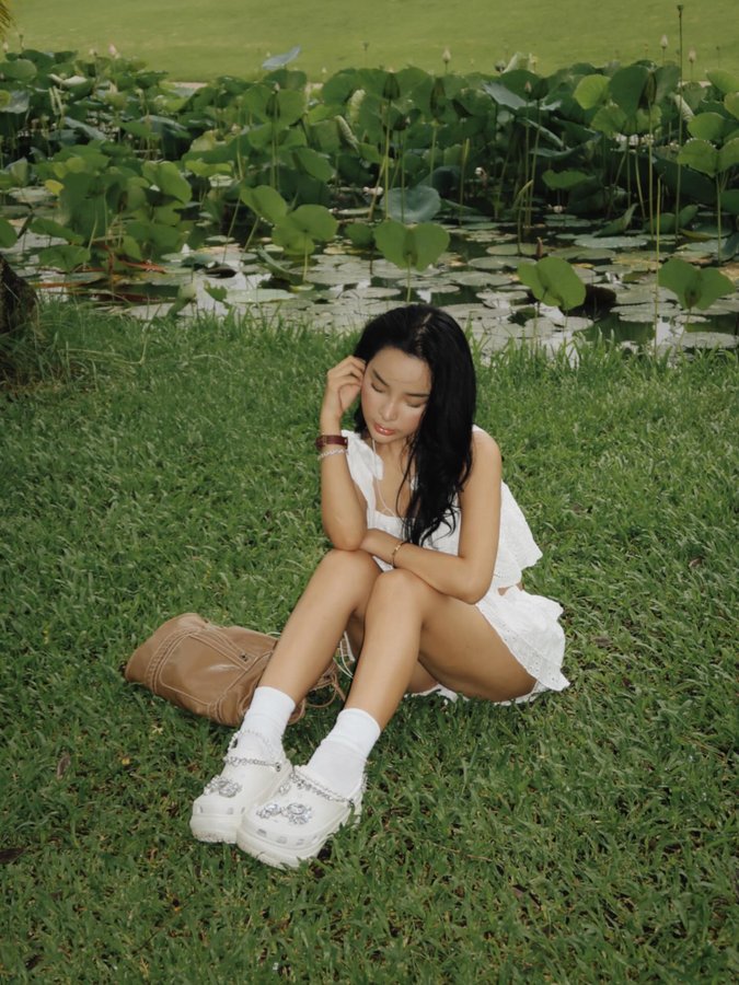 Instagram post by @xxeirazx for collAble. Caption reads: Garden picnic but make it glam....