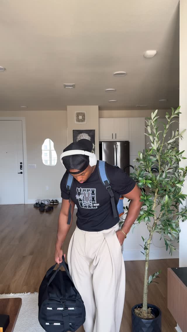 Instagram post by @lsaac.charles for Psycho Bunny. Caption reads: Always treat the airport like a runway....