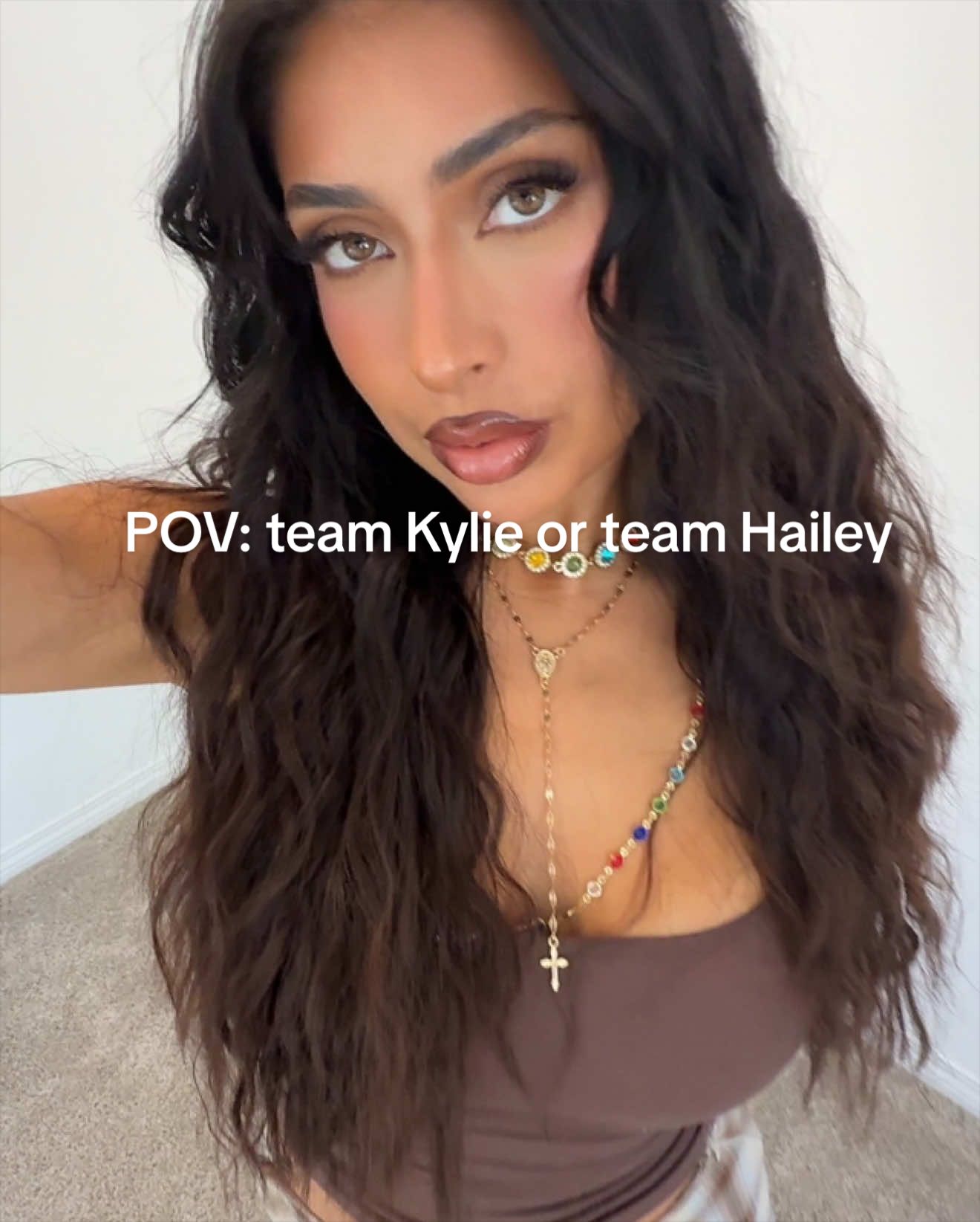 TikTok post by @cynthiamadridx for KEYYOU LASH. Caption reads: Which team are you?? 🖤🤎@Keyyoulash #lashclusters....