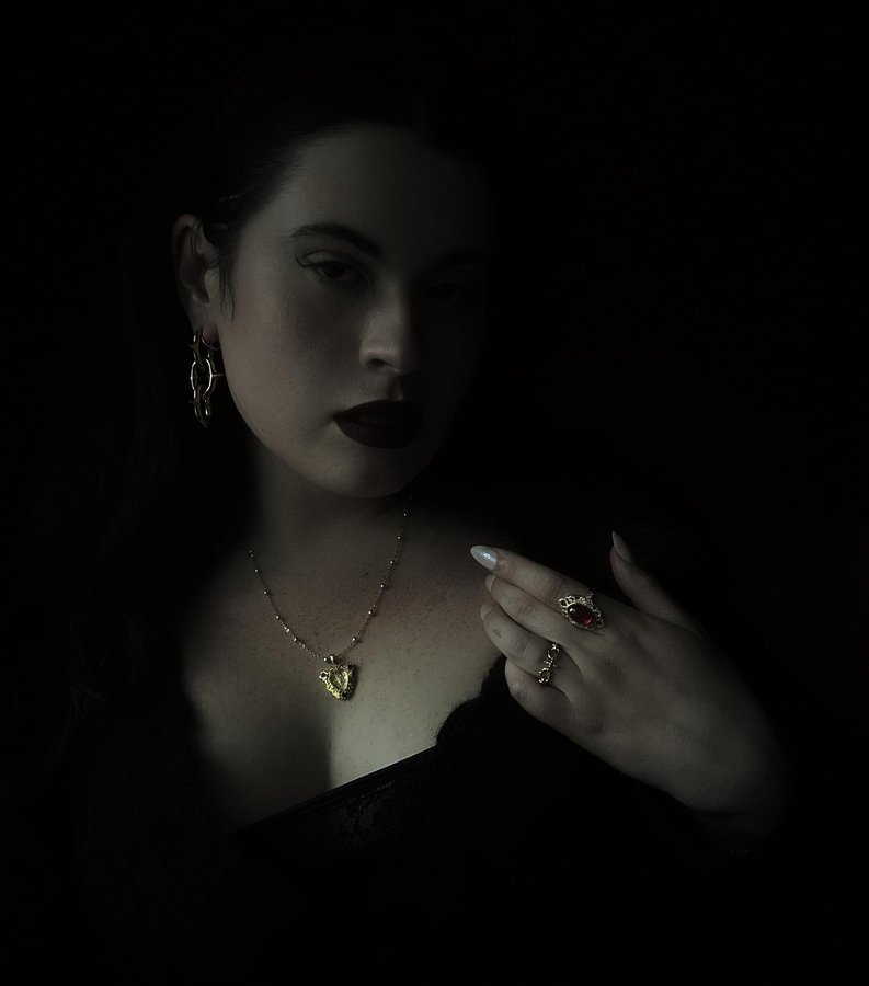 Instagram post by @thewolfinlace for Petals and Poison. Caption reads: Hey, so I bought that @sezane sweater that I said....