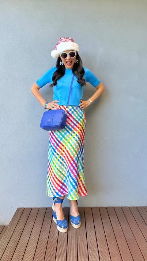 Instagram post by @dreams.of.colour for Pom Pom London. Caption reads: Wishing you all a happy and colourful Christmas!!....