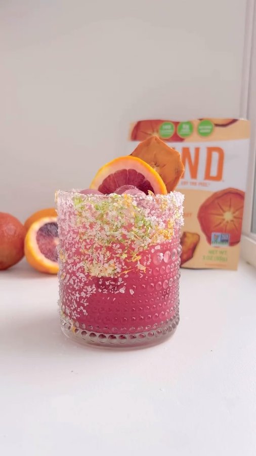 Instagram post by @farmacyrevolution_ for RIND Snacks. Caption reads: 🍊 ✨ Sip into something special for National....