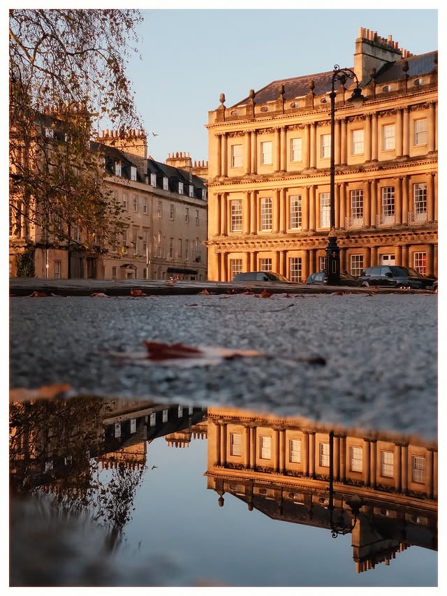 Instagram post by @_eat_sleep_travel_repeat for Fujifilm. Caption reads: [...] the puddle shots ☔️

SOOC photos taken on....