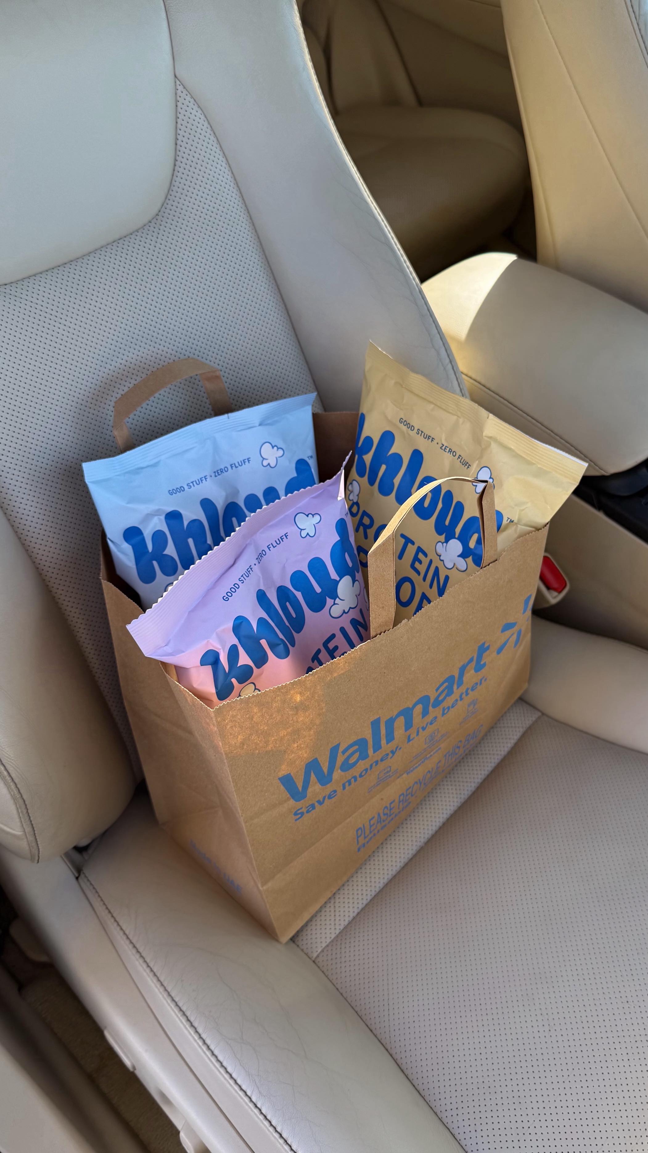 Instagram post by @hannahdtrick for KhloudFoods. Caption reads: elevate your snack game with @khloudfoods🍿☁️....