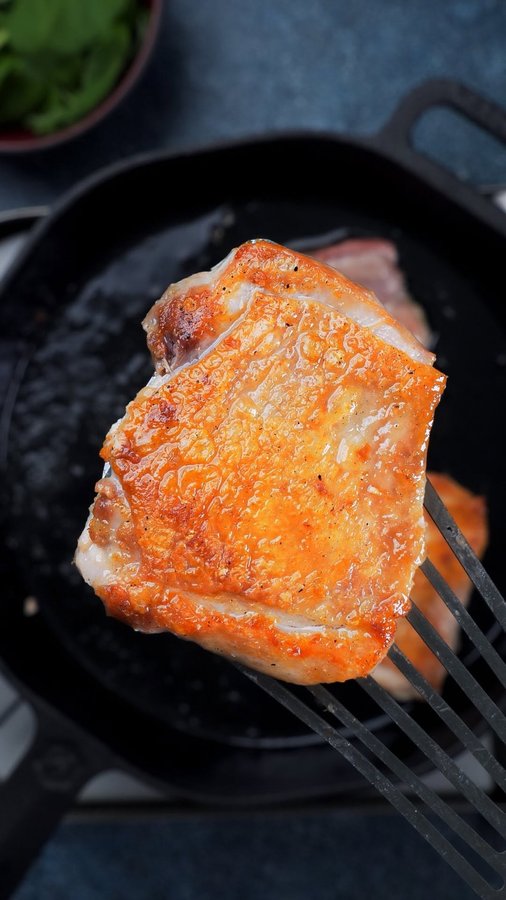 Instagram post by @mishkamakesfood for Bespoke Post. Caption reads: How to get perfect crispy chicken every time.

The....