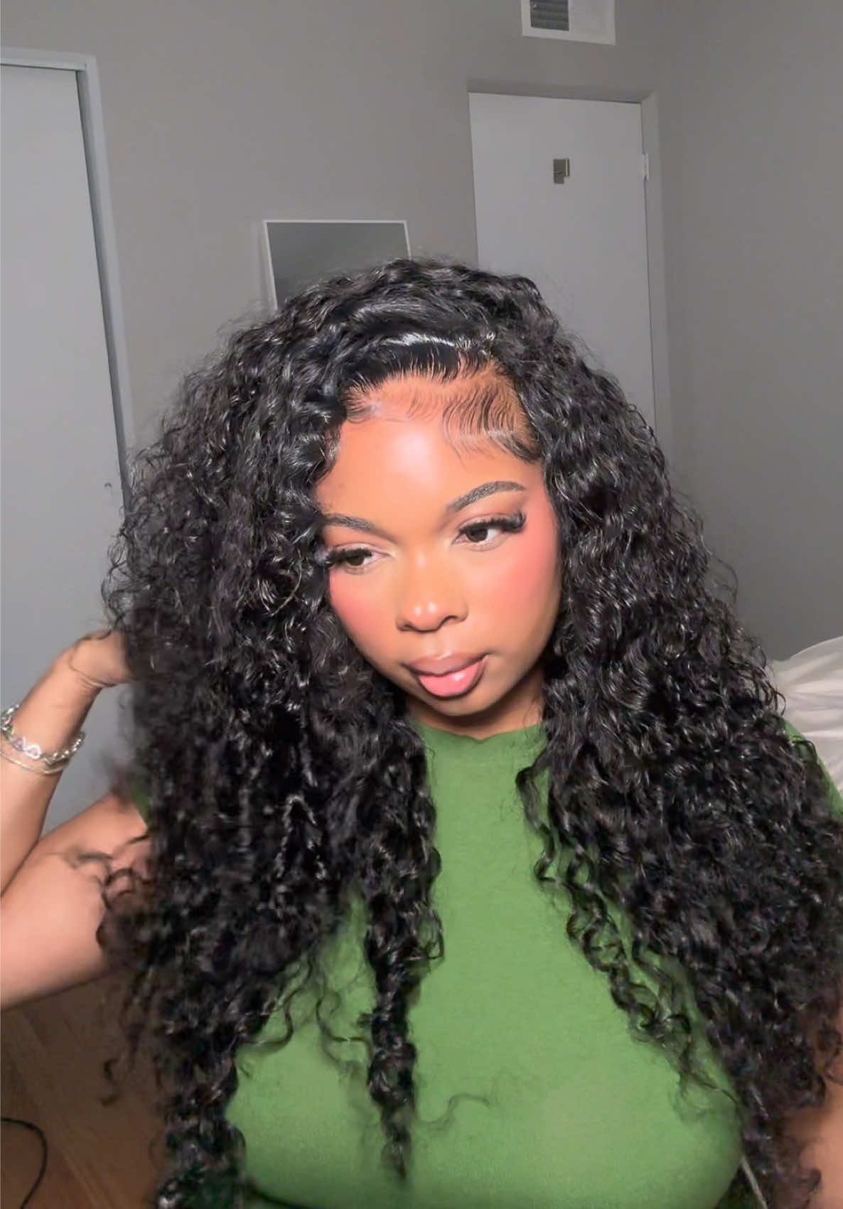 TikTok post by @thekennedyjay for CurlyMe Hair. Caption reads: Do a curly flipover w me! Ft @CurlyMe Hair 4....