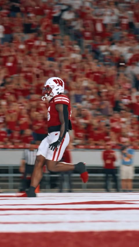 Instagram post by @bigtennetwork for Hilton. Caption reads: [...] in Wisconsin’s 36-9 win over WIU 😤 📍....