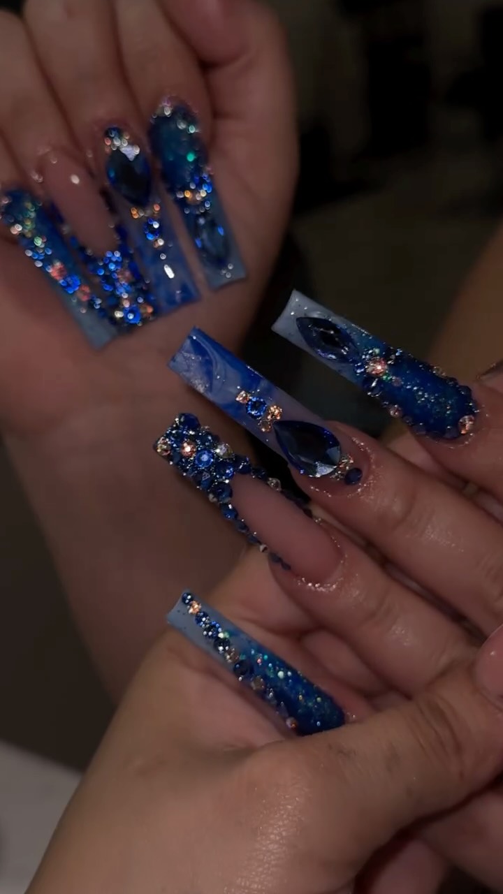 Instagram post by @nailssby.jess for Bluestreak Crystals. Caption reads: [...] my fav blue set😍 crystals from....