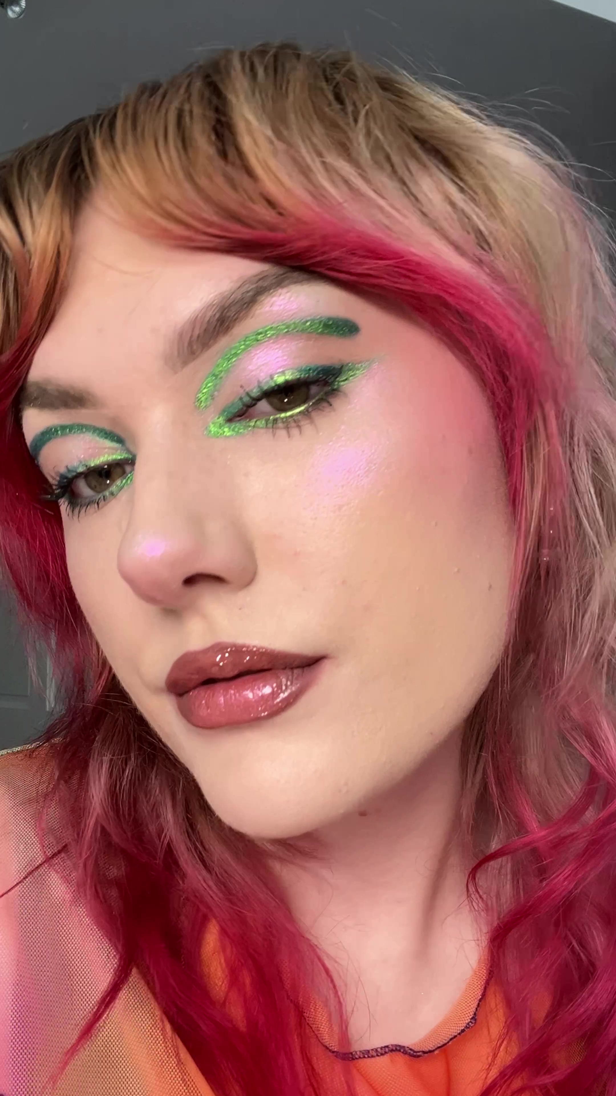TikTok post by @fairyxfreak for Kaleidos Makeup. Caption reads: AD Glowing this pride month with @Kaleidos Makeup....